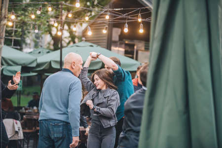 Photo for Lviv, Ukraine - May 10, 2019: people dancing outdoors at central city square. lifestyle - Royalty Free Image