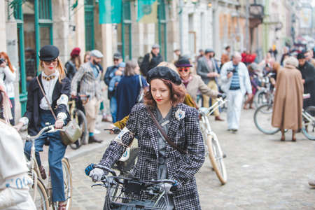 Lviv, Ukraine - May 4, 2019: city birthday festival people ride old retro bicycles. copy space