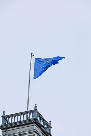 european union flag in front of blue sky copy space