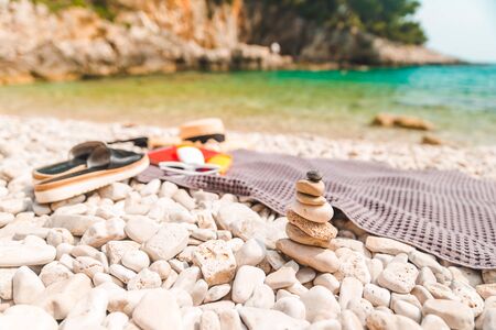 rocks in balance at sea beach copy space summer timeの写真素材