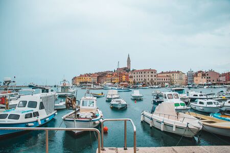 view of Rovinj harbour at rainy weather. copy space