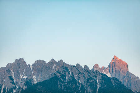 view of alpine mountains on sunset. copy spaceの写真素材