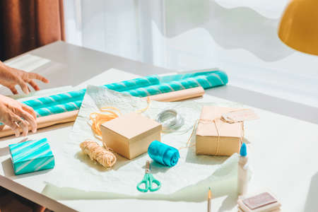 packing gift box with wrapping paper copy space