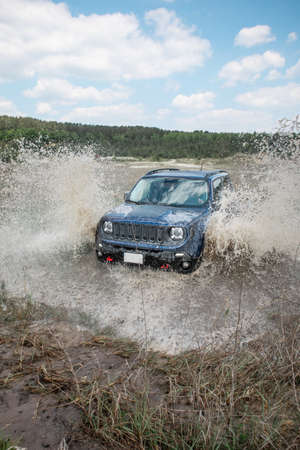 off road concept. car overcoming swamp barrier. copy space