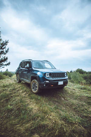 suv car travel concept by dirty road