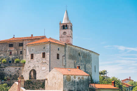 old european architecture bell tower in plomin croatiaの写真素材