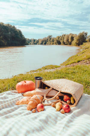 picnic at river beach autumn sunny day copy spaceの写真素材