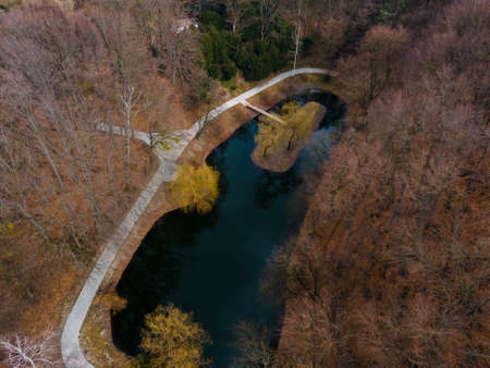 aerial view of city park lake in the forest copy spaceの写真素材