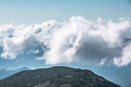 landscape view of mountains with clouds. copy space