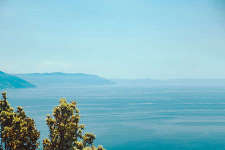 sea bay with mountains on background and blue sky copy spaceの写真素材