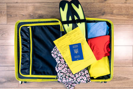 ukraine passport vaccination at bags with stuff