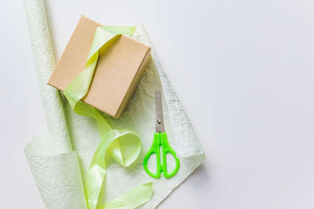 packing gift box with wrapping paper copy spaceの写真素材
