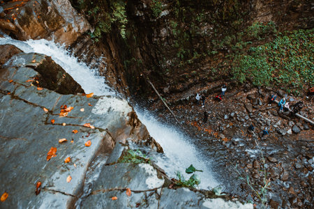 autumn waterfall in forest copy space