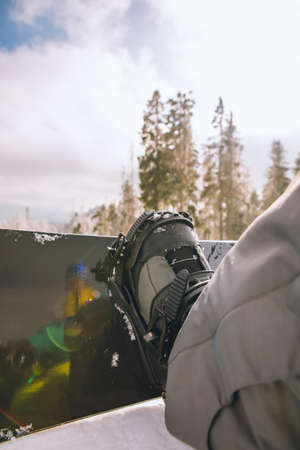 close up man boots strap in snowboard copy spaceの写真素材