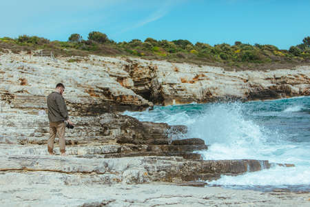 professional photographer shooting seascape