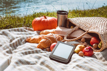 picnic at river beach autumn sunny day copy spaceの写真素材