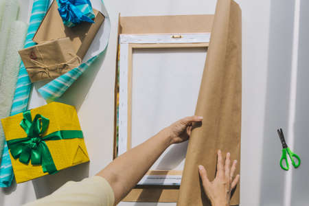 packing gift box with wrapping paper copy space