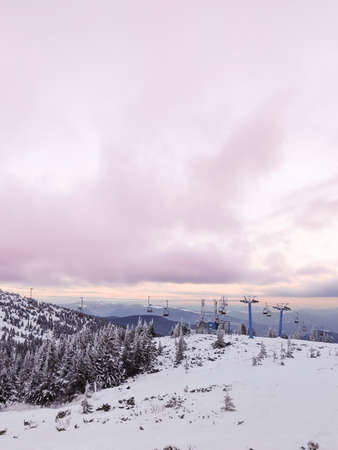 sunset above mountains ski resort copy spaceの写真素材