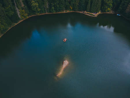 aerial view of carpathian lake synevyr autumn seasonの写真素材
