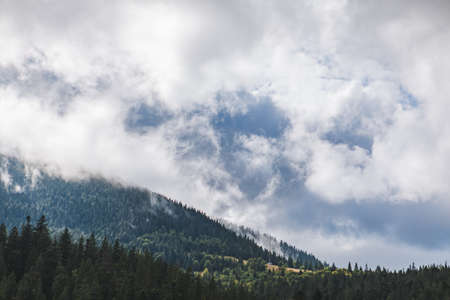 landscape view of carpathian mountains white cloudy dayの写真素材