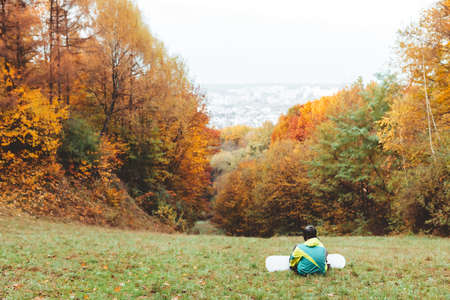 snowboarder waiting for ski seasonの写真素材