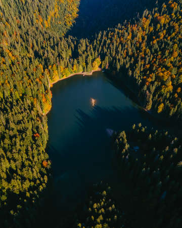 aerial view of carpathian lake autumn season copy spaceの写真素材