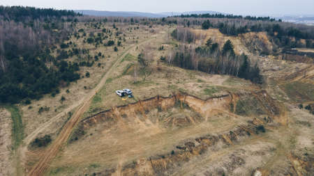 aerial view of campsite two suv car with camping chairs. people resting outdoors. friends together activitiesの写真素材