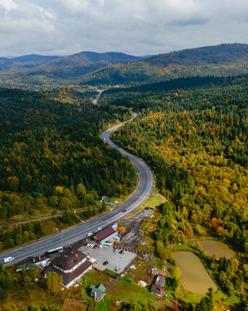 aerial view of speedway road in autumn carpathian mountainsの写真素材