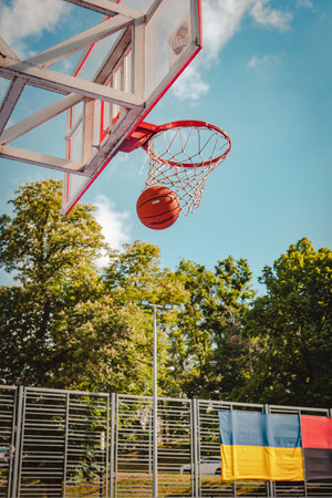 basketball rim with ball in net
