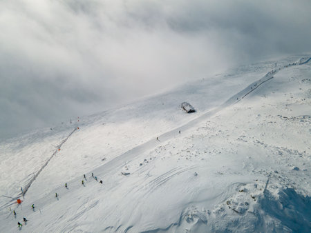 aerial view of ski slope in slovakia mountainsの写真素材
