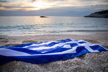 greece flag at sea beachの写真素材
