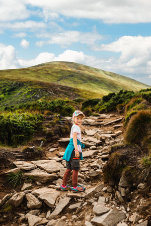 A girl climbs a mountainの写真素材