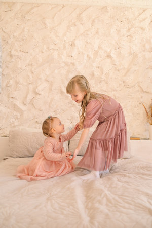 two cute sisters portraitの写真素材