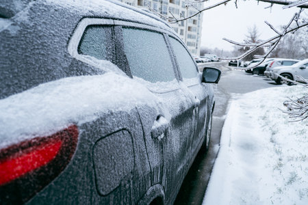 car covered with ice after snowstormの写真素材