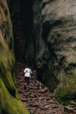 couple tourists walking by canyonの写真素材