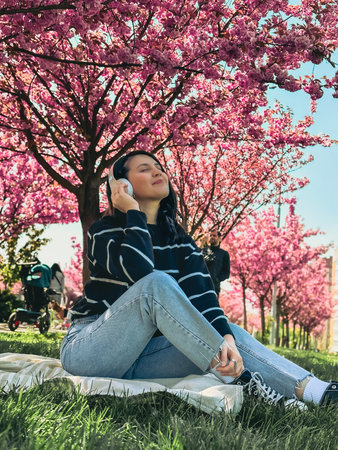 stylish woman meloman listening music