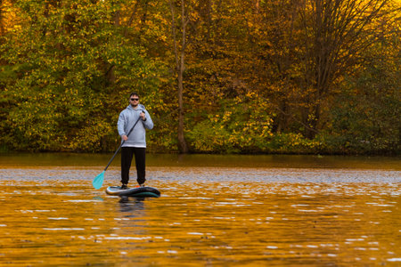 Paddleboarding in Autumn Serenity