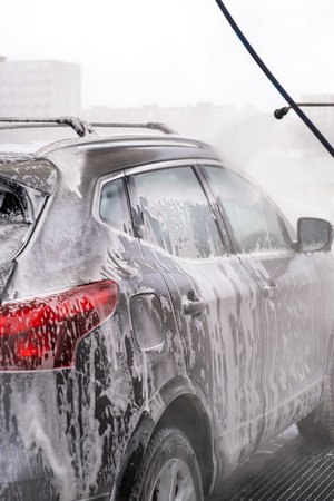 SUV Being Washed at Car Washの写真素材