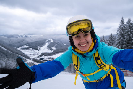 Smiling Skier on Snowy Slopeの写真素材