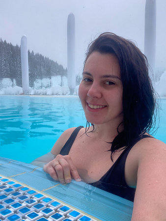 Winter Poolside Relaxation in Snowy Landscapeの写真素材