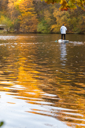 Paddleboarding in Autumn Serenityの写真素材