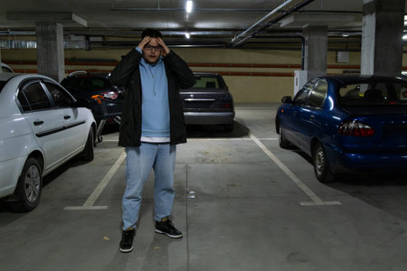 Person in Underground Parking Garageの写真素材