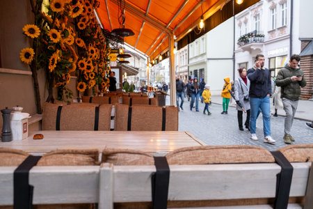 Charming Outdoor Cafe with Sunflower Decorの写真素材