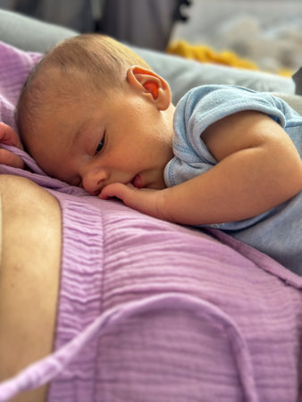 Newborn Baby Resting on mother tummyの写真素材