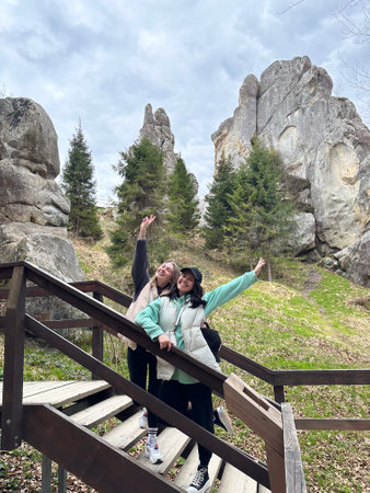 Women Enjoying Nature on a Staircaseの写真素材