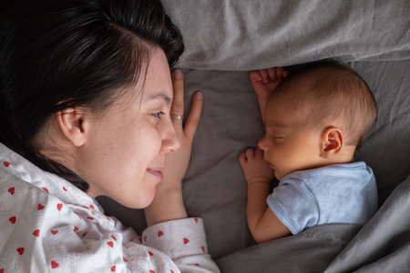 Mother and Baby Sleeping Peacefully Together