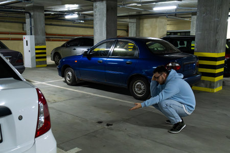 Person in Underground Parking Garageの写真素材