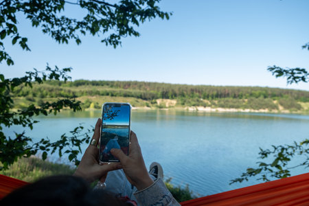 Capturing Lake View from Hammockの写真素材