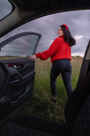 Person in Red Jacket Standing in Field
