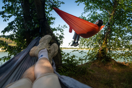Relaxing in Hammocks by the Lakeの写真素材